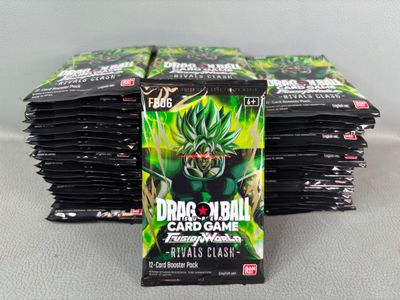 several packs of dragon ball cards are stacked on top of each other
