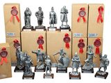 a lot of silver figurines that are on display