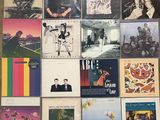 a lot of vinyl records on the floor