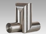 a pair of stainless steel pipes on a white background