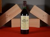 a bottle of wine that is sitting on a table