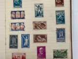 an open book with a lot of stamps on it