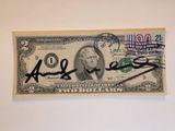 an image of a dollar bill with a signed signature on it