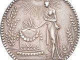 l'image d'une pièce d'argent représentant une femme tenant une fleur