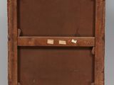 an old wooden easel with a piece of paper on top of it
