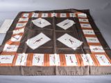 a blanket that has a picture of birds on it