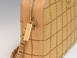 chanel beige quilted leather cosmetic case