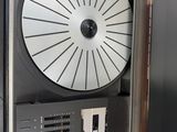 an image of a clock that is inside of a door