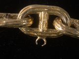 a close up of a chain with a clasp on it