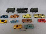 a lot of toy cars and a train on a table