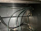 a bunch of hoses that are connected to the inside of a machine
