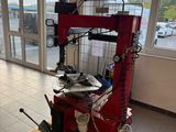 a machine that is sitting on a pallet in a room
