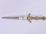 a small knife that is laying on a white surface