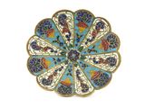 a close up of a plate with a flower design on it