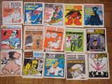 a lot of comic books on the table