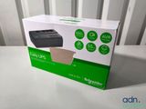 an open box of a printer sitting on top of a table