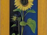 peinture représentant un tournesol dans un cadre en bois sur fond bleu