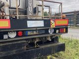 a truck that is parked on the side of the road