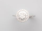 an 18k white gold diamond cluster ring