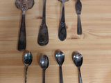 a lot of spoons and spoon spoons on a table