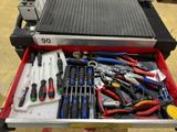 many tools in a tool box on the table