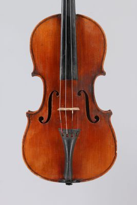 an old violin with a bow on a white background