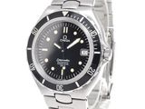 an image of a stainless steel watch with a black dial