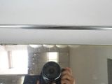 a person taking a picture of themselves in a mirror