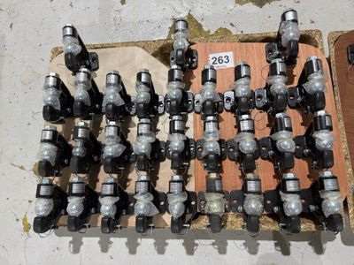 a lot of different types of valves on a pallet