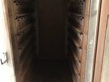 a small oven that has a door open on the outside