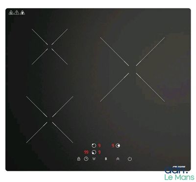 un gros plan d'une plaque de cuisson noire munie de boutons