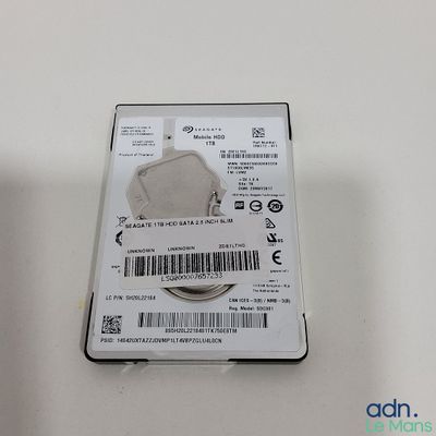 an image of a hard drive sitting on top of a white table