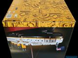 a box that has a model of a ship in it