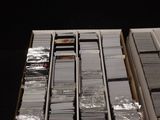 a box full of cards and other items on a table