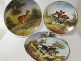 three plates with a picture of a deer and a deer on them