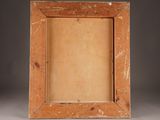 an old wooden picture frame with a brown paint on it