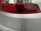 a close up of a car ' s tail light and tail light