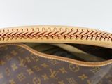 the inside of a louis vuitton bag with stitching on it
