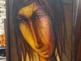 an image of a painting of a woman with long hair in front of a brick wall