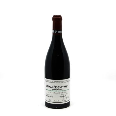 a bottle of wine that is sitting on a table