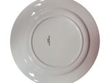 a white plate that has a black and white label on it