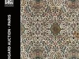 a close up of a rug with a pattern on it