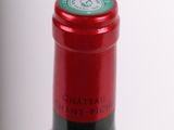 a bottle of wine that is sitting on a table