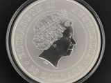une image représentant une pièce d'argent à l'effigie de la reine Élisabeth