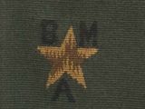 an image of a close up of a military uniform with a star on it