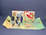 a bunch of figurines that are sitting on a table
