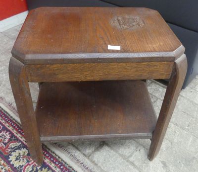 a small wooden table with a small shelf on it
