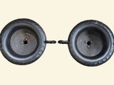 two black wheels on a white background