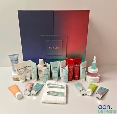 the contents of a beauty box are displayed on a table
