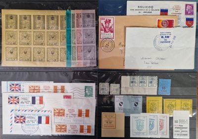 many different types of stamps and envelopes on the table